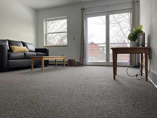a living room with a couch and a table